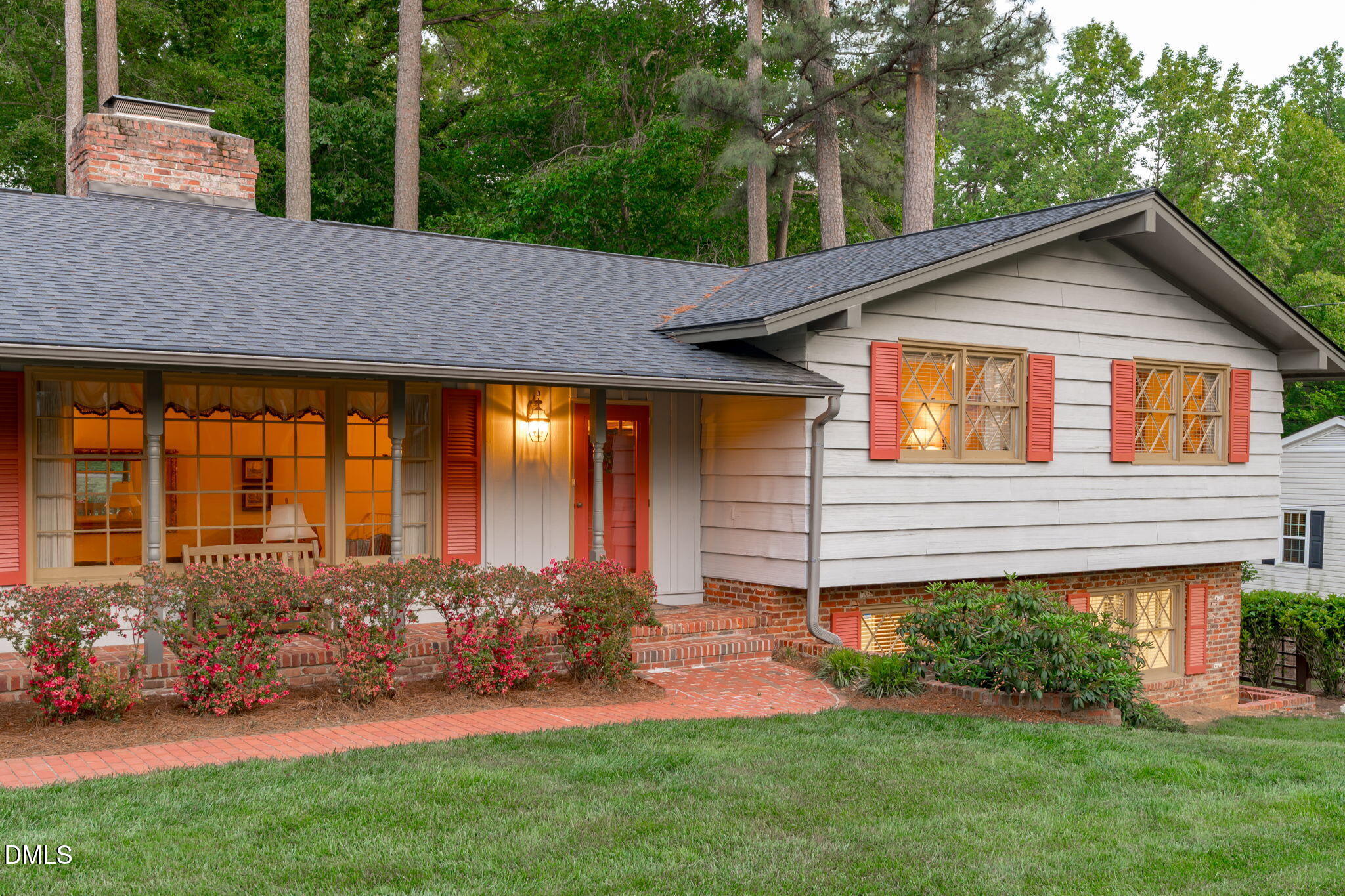 1205 Kimberly Drive Raleigh, NC 27609 - Photo 2 of 45 a view of a house with a yard potted plants and a table