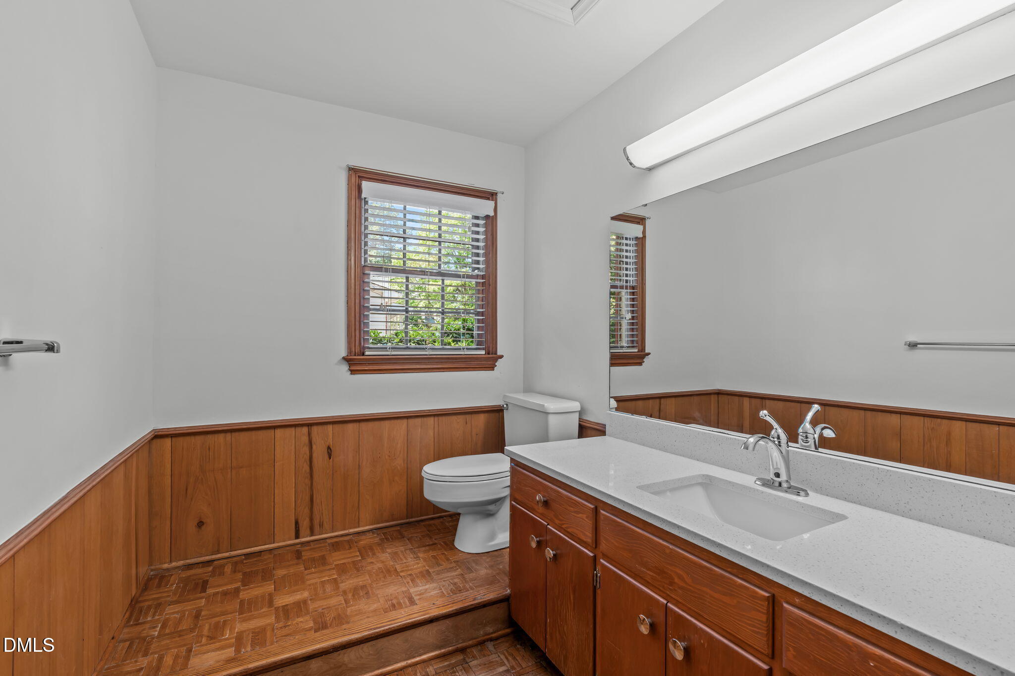 1205 Kimberly Drive Raleigh, NC 27609 - Photo 31 of 45 a bathroom with a sink and a mirror