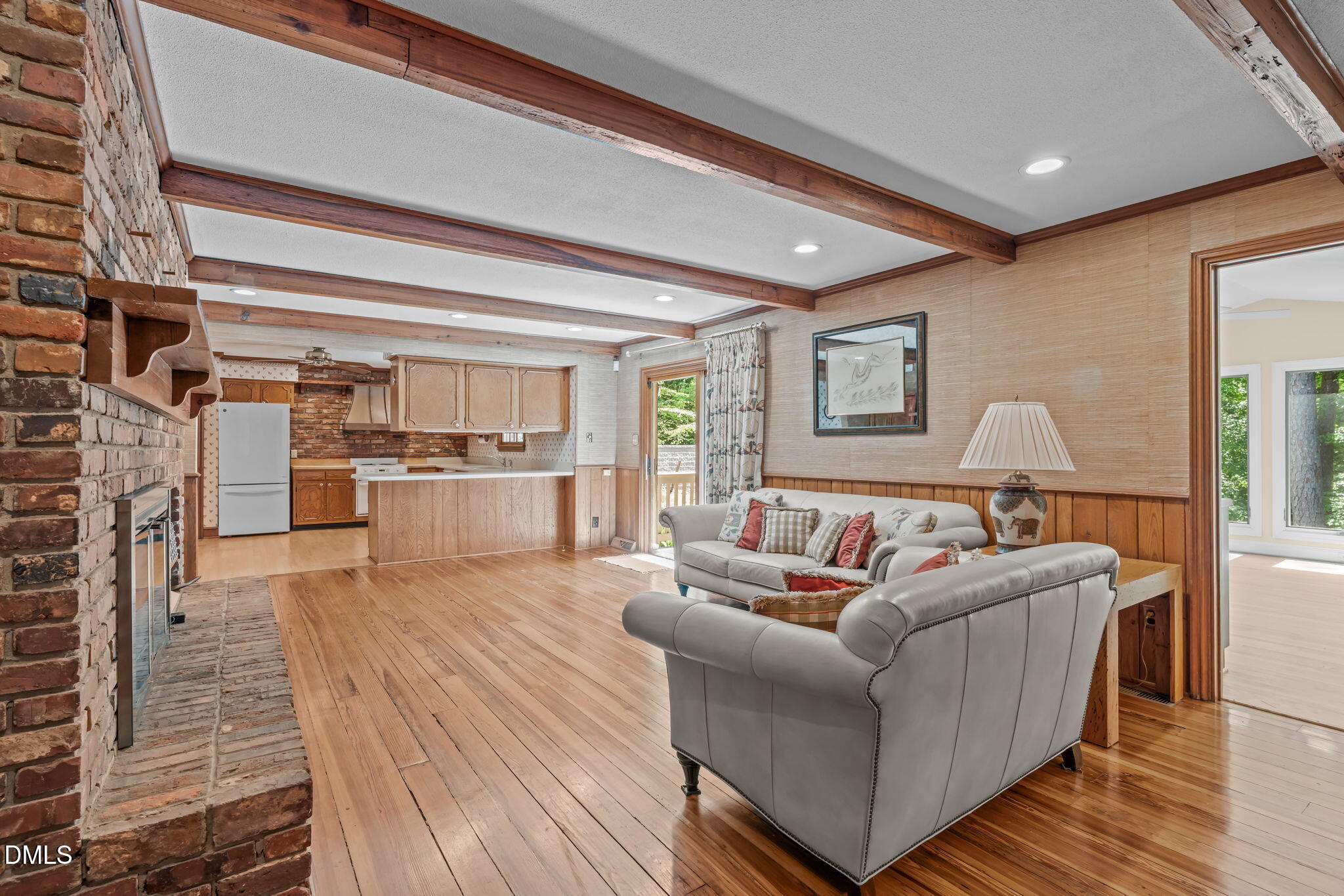 1205 Kimberly Drive Raleigh, NC 27609 - Photo 3 of 45 a living room with furniture and a wooden floor