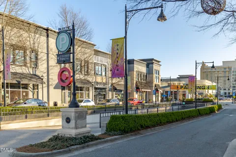 a view of street with sitting area