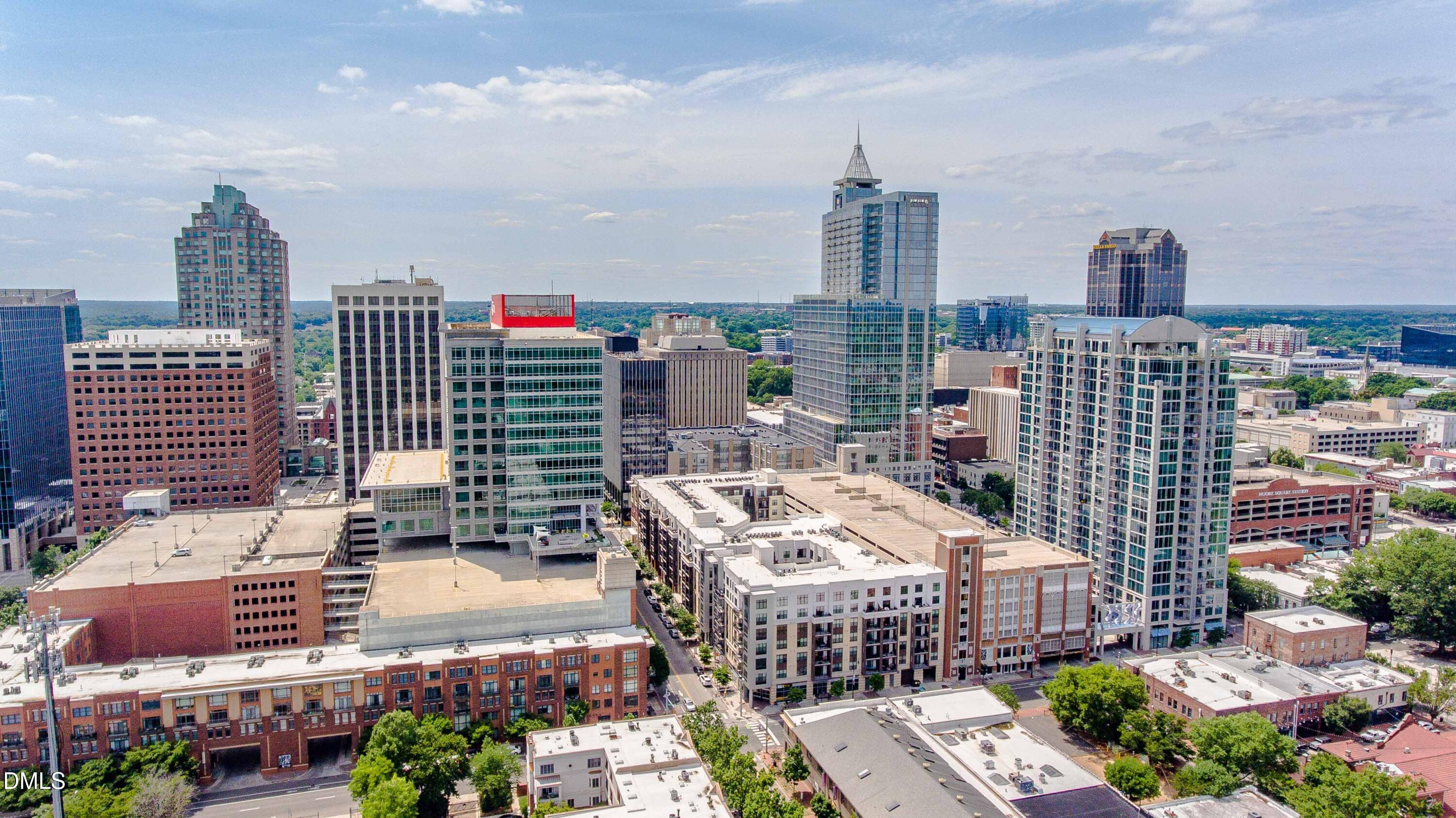 1205 Kimberly Drive Raleigh, NC 27609 - Photo 43 of 45 a view of city with tall buildings
