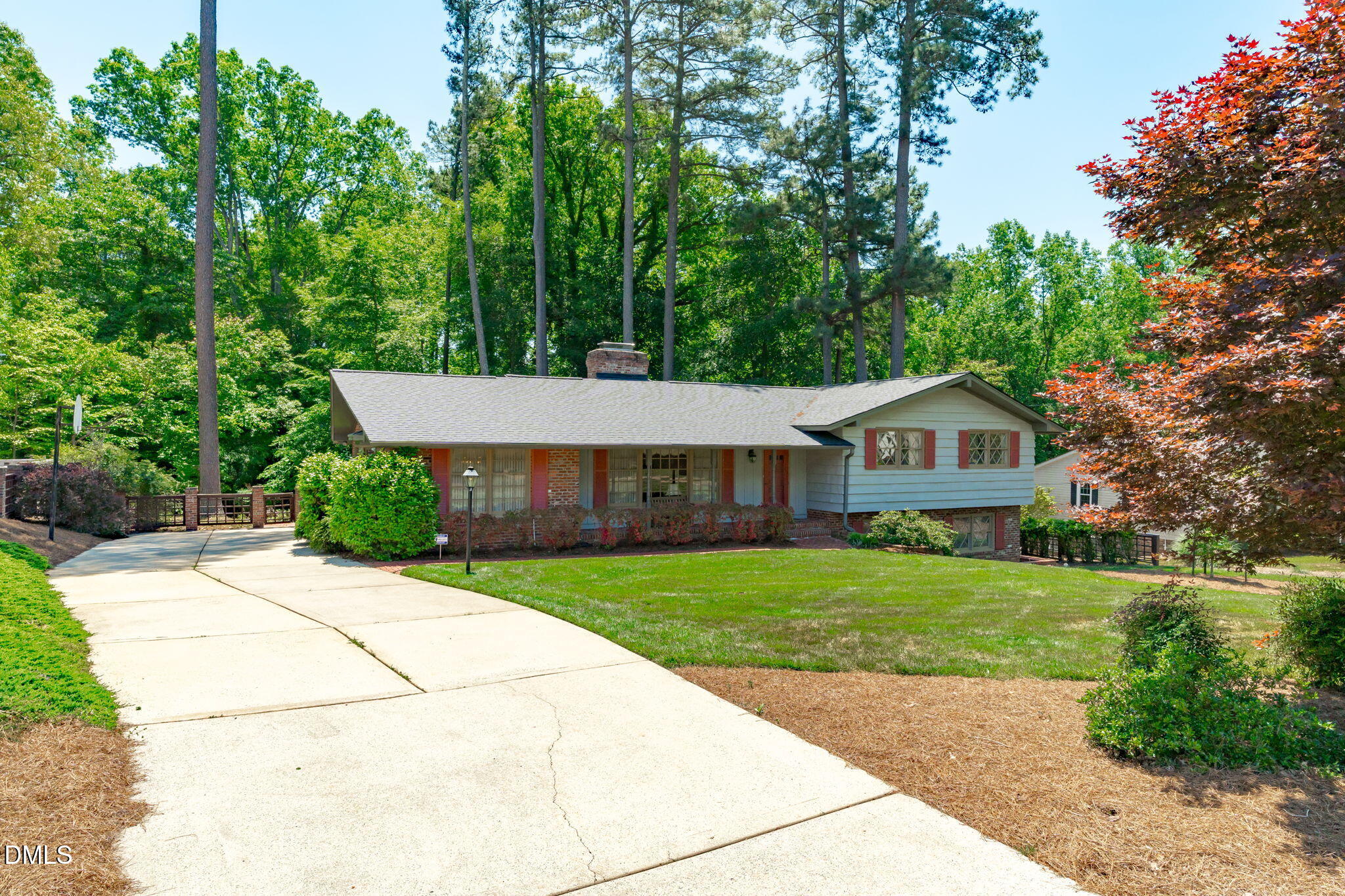 1205 Kimberly Drive Raleigh, NC 27609 - Photo 8 of 45 a front view of a house with garden
