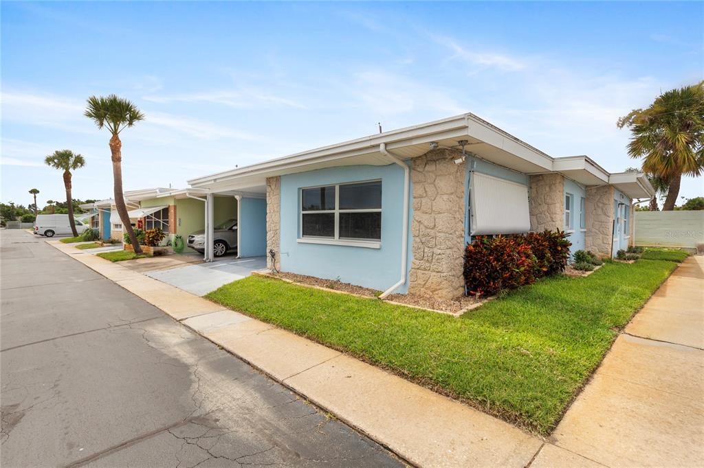 a house view with a garden space