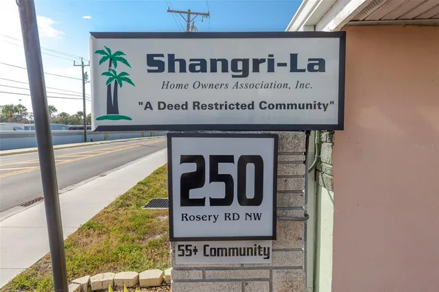 a sign that is on the side of a building