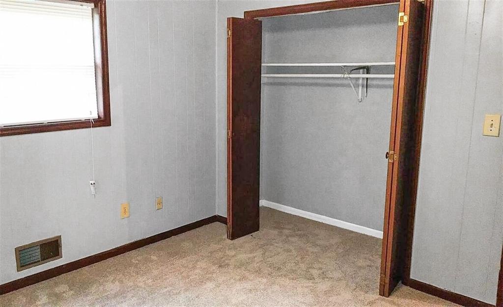 5844 Old Bill Cook Road Atlanta, GA 30349 - Photo 2 of 32 a view of an empty room