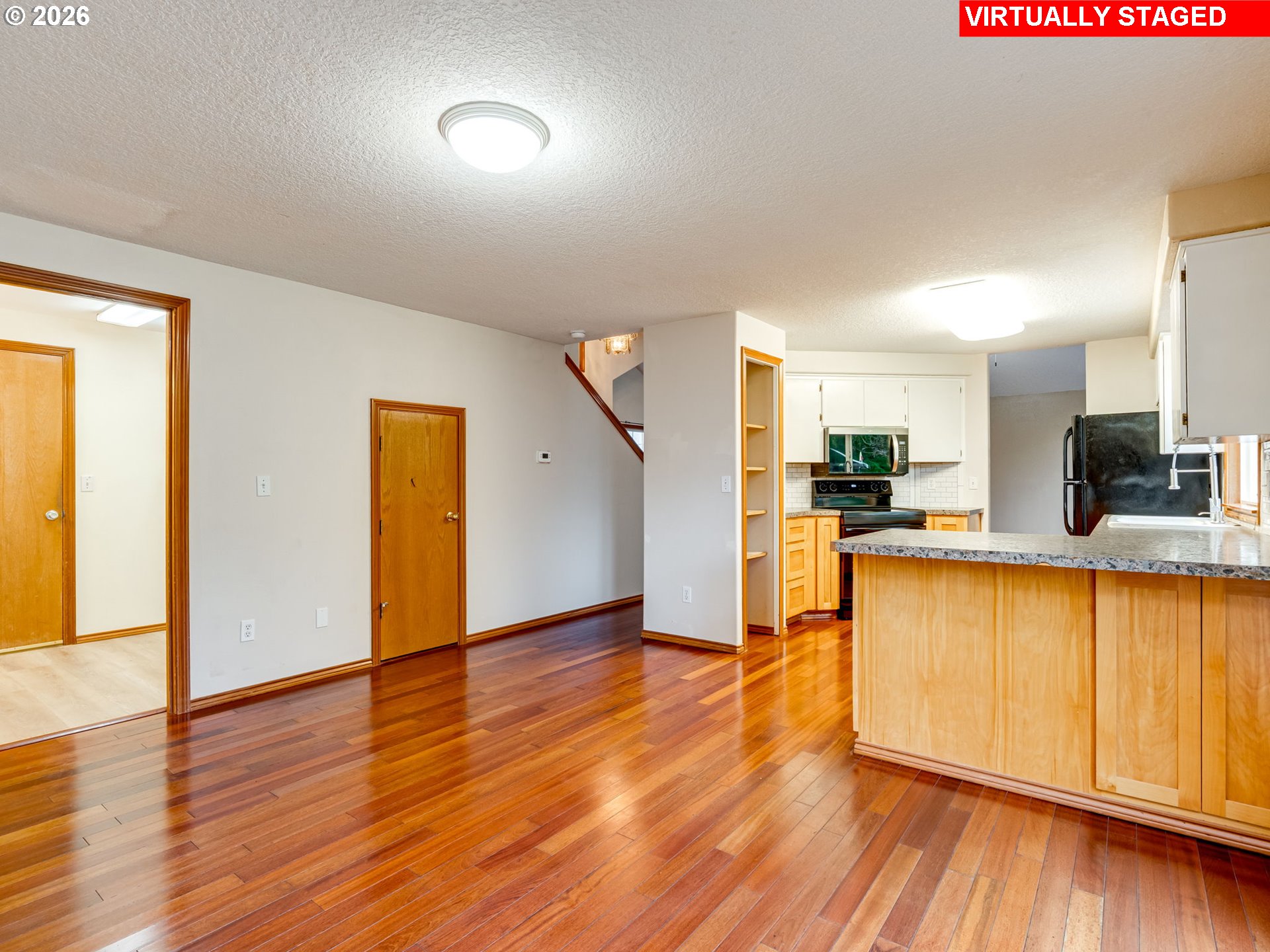 1250 South Cedar Loop Canby, OR 97013 - Photo 16 of 42 a view of kitchen with furniture and wooden floor