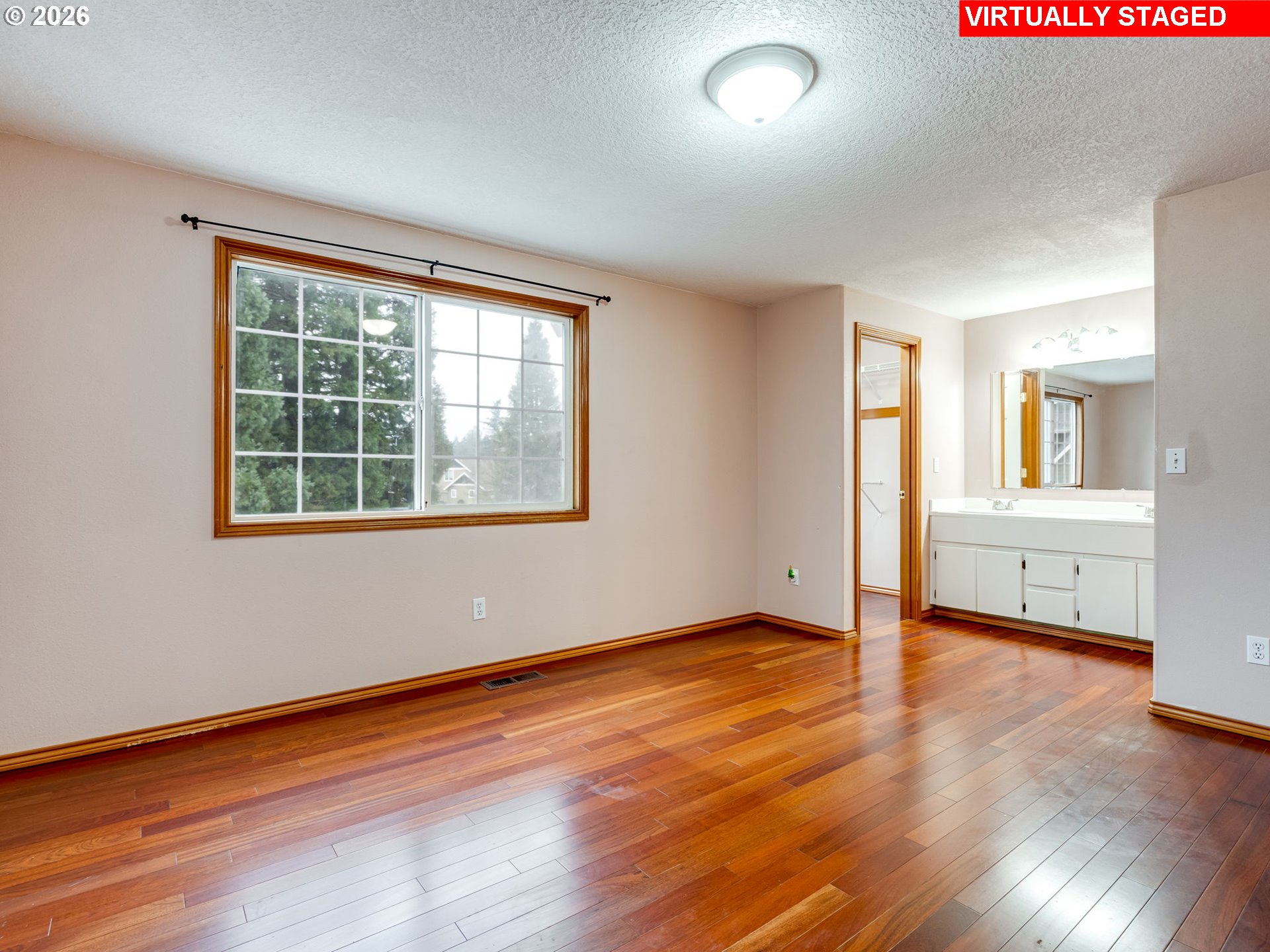 1250 South Cedar Loop Canby, OR 97013 - Photo 27 of 42 an empty room with wooden floor and windows