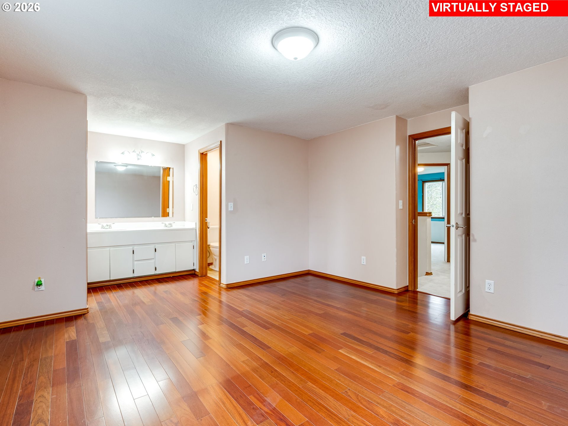 1250 South Cedar Loop Canby, OR 97013 - Photo 28 of 42 an empty room with wooden floor and windows