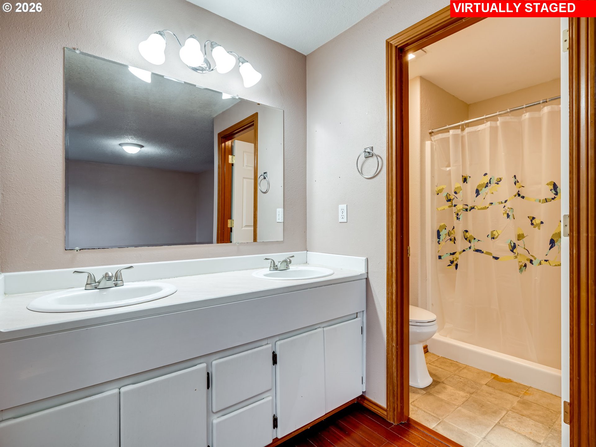 1250 South Cedar Loop Canby, OR 97013 - Photo 29 of 42 a bathroom with a double vanity sink mirror and shower