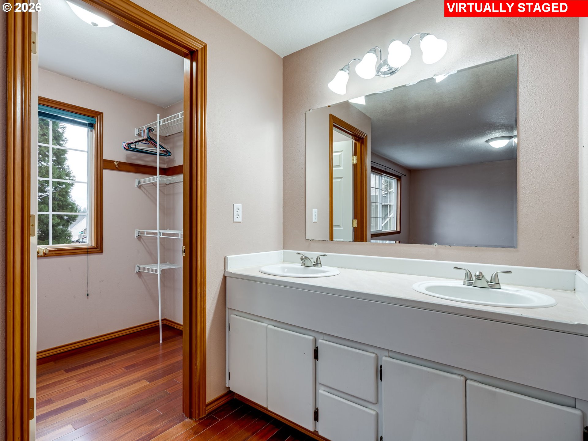 1250 South Cedar Loop Canby, OR 97013 - Photo 30 of 42 a bathroom with a double vanity sink and a mirror