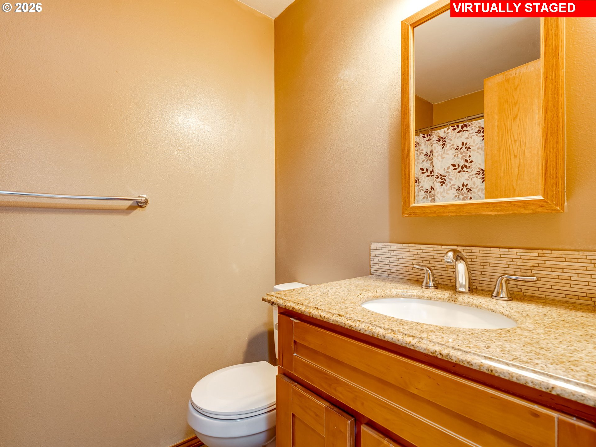1250 South Cedar Loop Canby, OR 97013 - Photo 31 of 42 a bathroom with a granite countertop sink toilet and a mirror