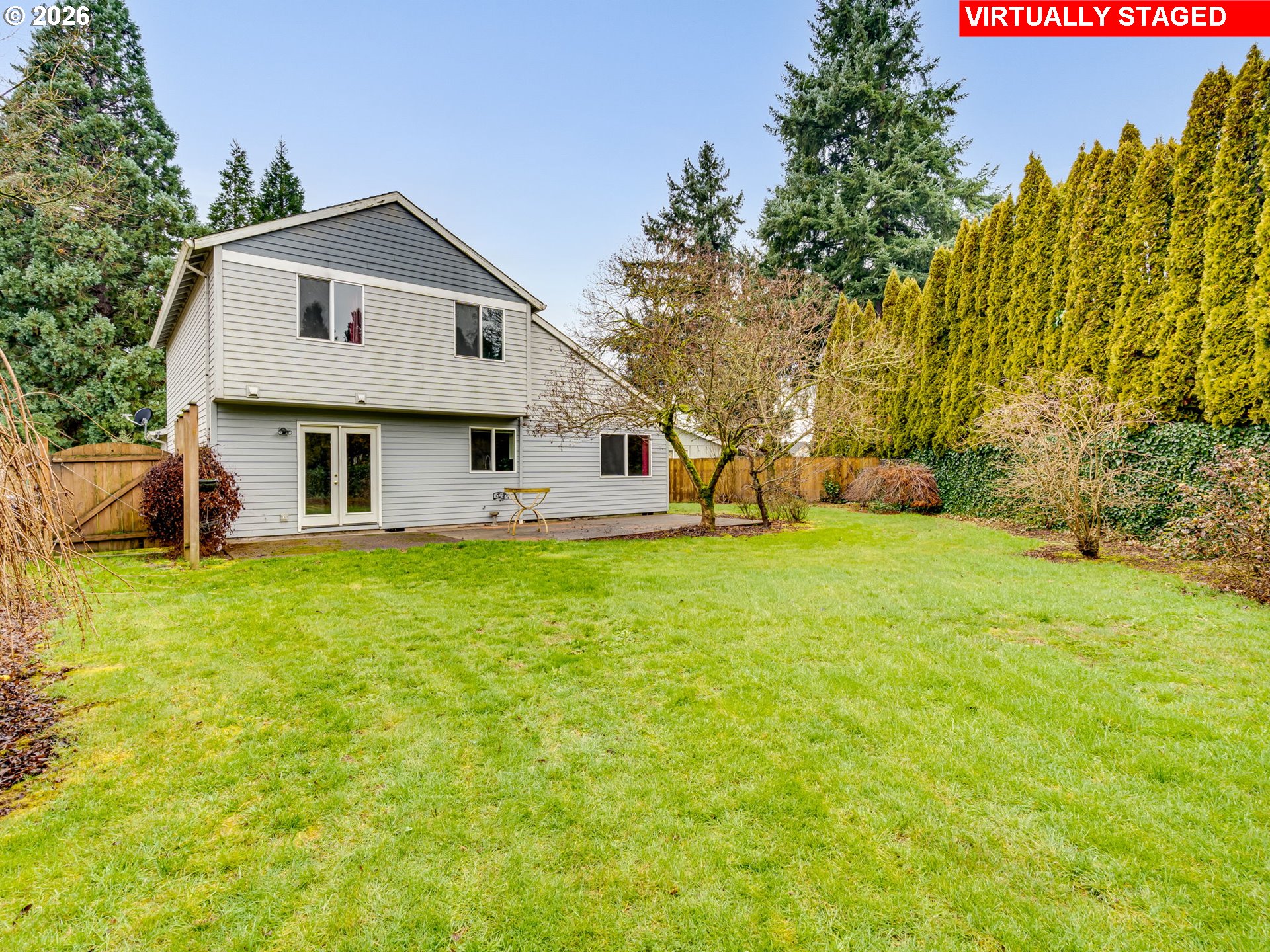 1250 South Cedar Loop Canby, OR 97013 - Photo 41 of 42 a front view of a house with yard and green space