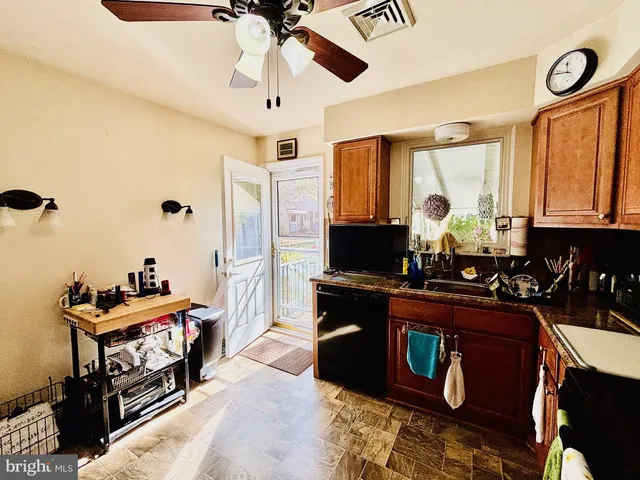 a room with furniture and musical instruments