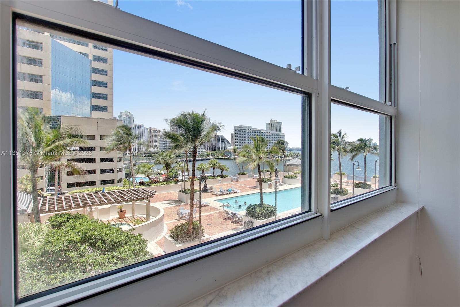 1111 Brickell Bay Drive, Unit 1102 Miami, FL 33131 - Photo 35 of 72 a view of a back yard from a window