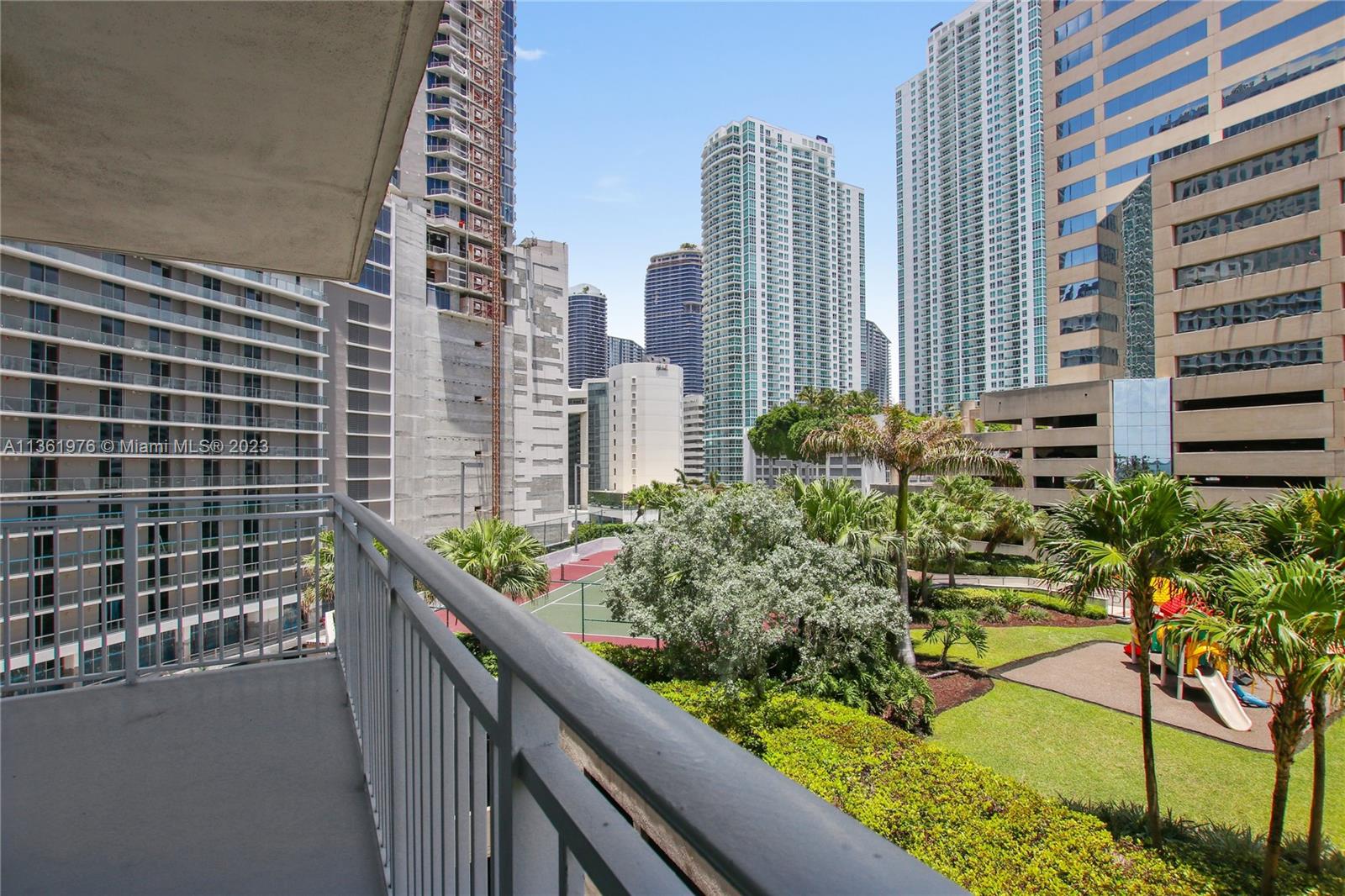 1111 Brickell Bay Drive, Unit 1102 Miami, FL 33131 - Photo 36 of 72 a view of a city with tall buildings