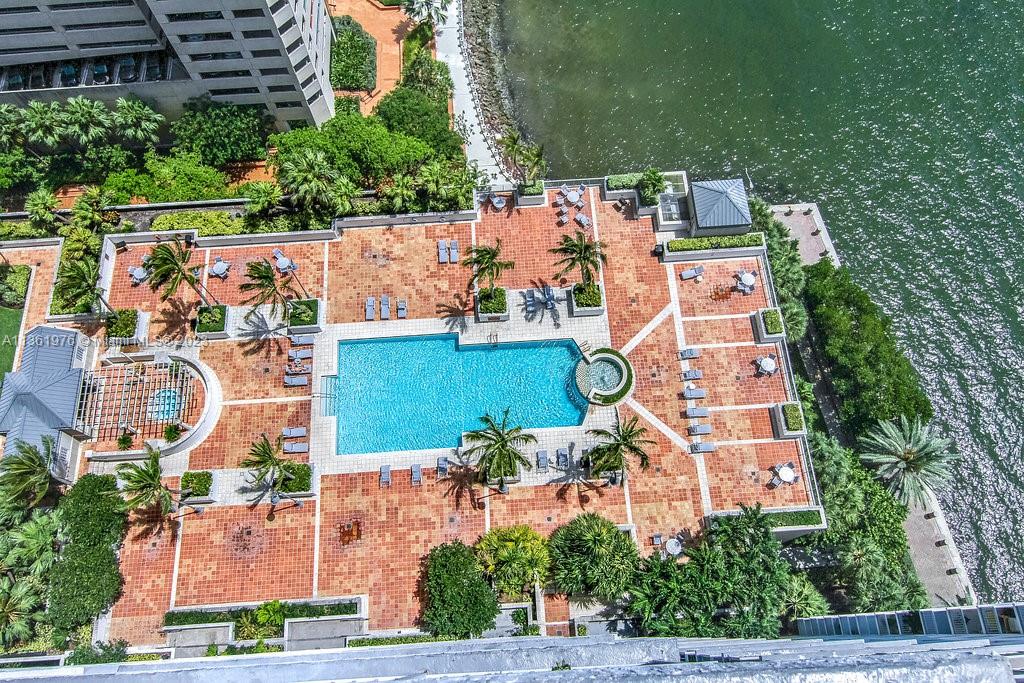 1111 Brickell Bay Drive, Unit 1102 Miami, FL 33131 - Photo 54 of 72 an aerial view of a house with a yard