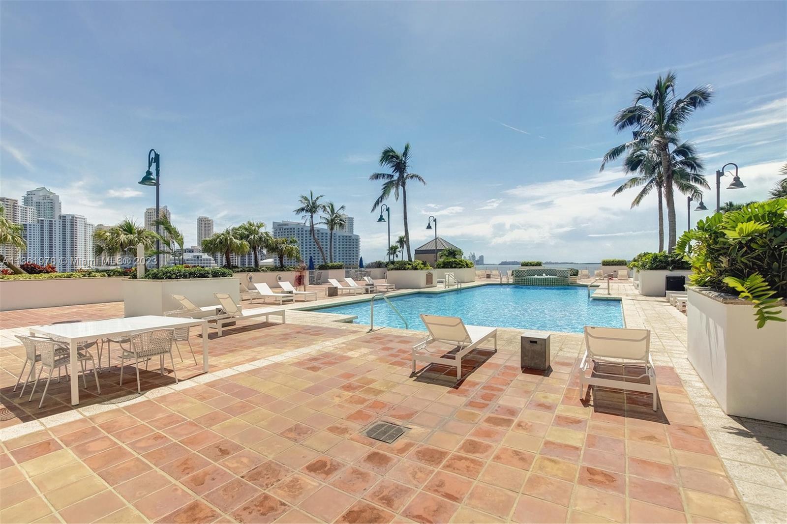 1111 Brickell Bay Drive, Unit 1102 Miami, FL 33131 - Photo 57 of 72 a view of a swimming pool and outdoor space