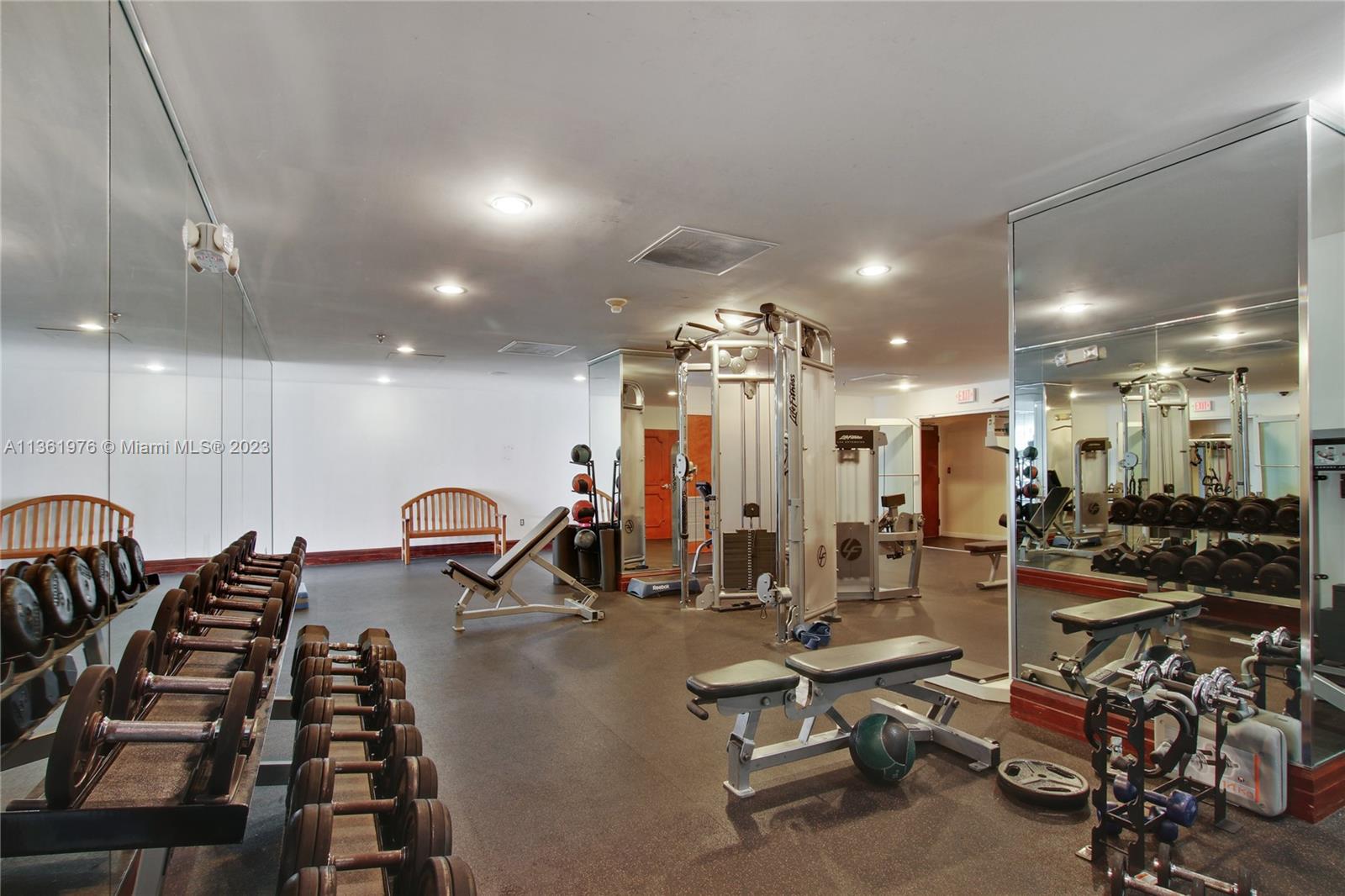 1111 Brickell Bay Drive, Unit 1102 Miami, FL 33131 - Photo 69 of 72 a view of a room with gym equipment