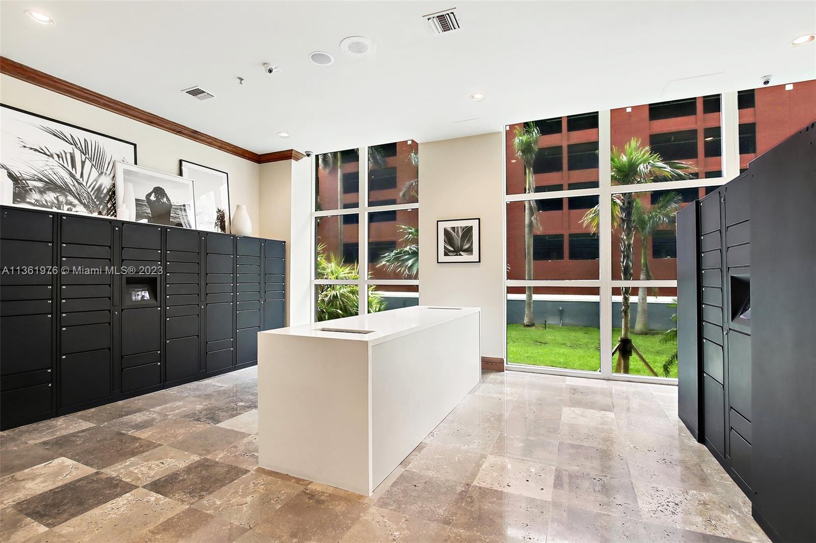 1111 Brickell Bay Drive, Unit 1102 Miami, FL 33131 - Photo 71 of 72 a view of a house with a backyard