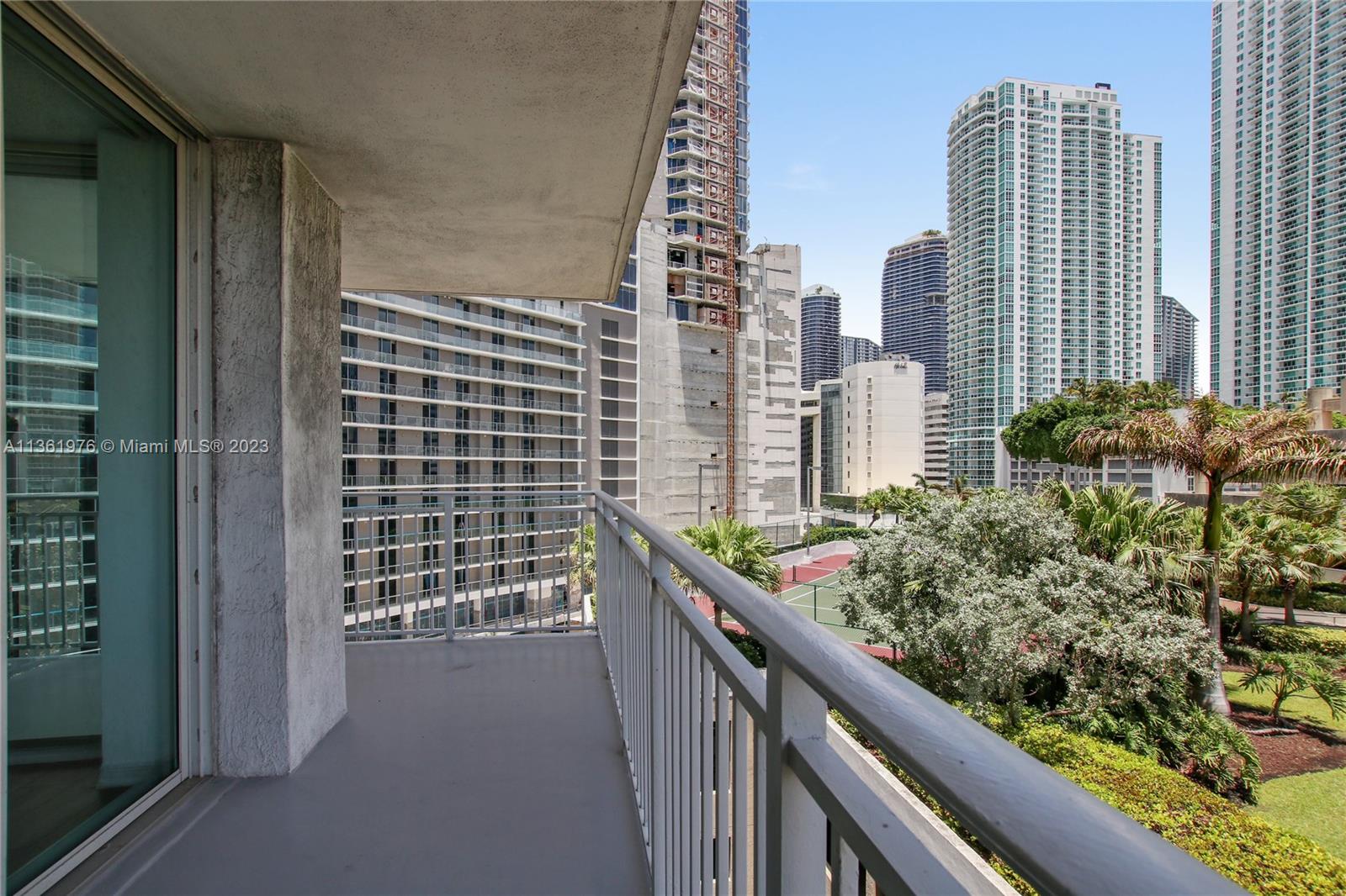 1111 Brickell Bay Drive, Unit 1102 Miami, FL 33131 - Photo 9 of 72 a view of a city from a balcony