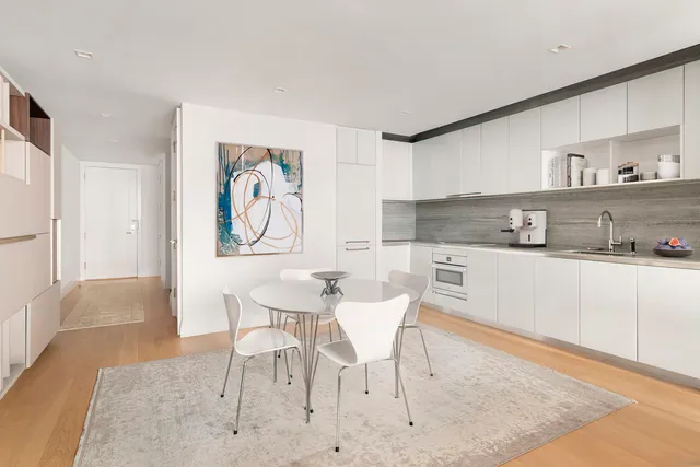 a living room with fireplace furniture and a flat screen tv