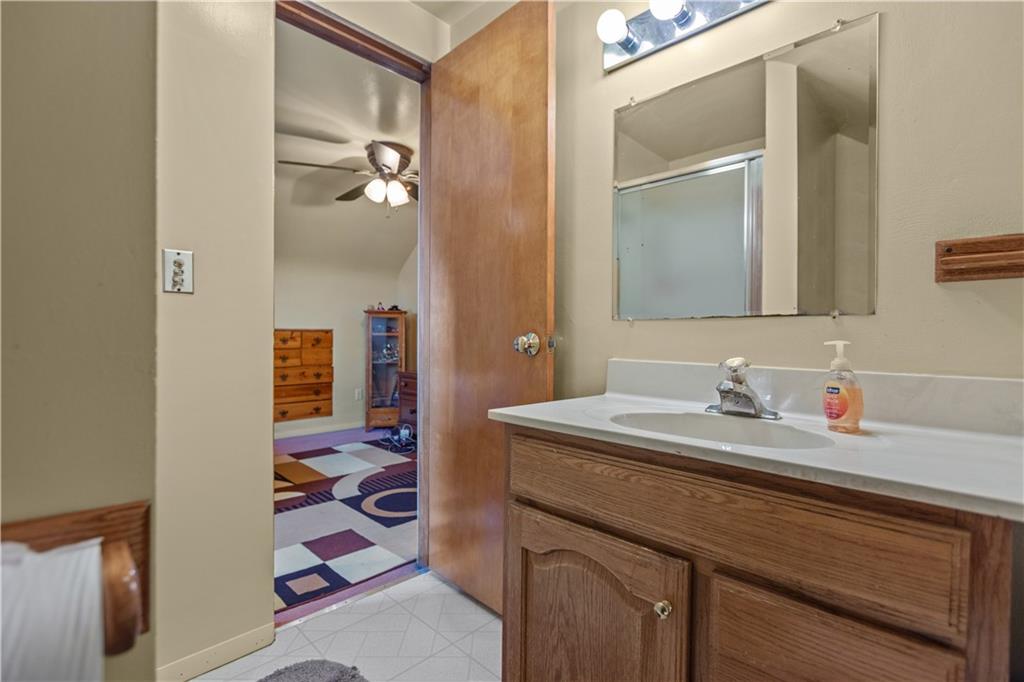 10204 Pearl Road Pittsburgh, PA 15235 - Photo 17 of 32 a bathroom with a sink and a mirror