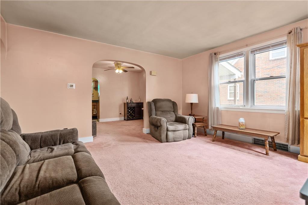10204 Pearl Road Pittsburgh, PA 15235 - Photo 2 of 32 a living room with furniture and a large window
