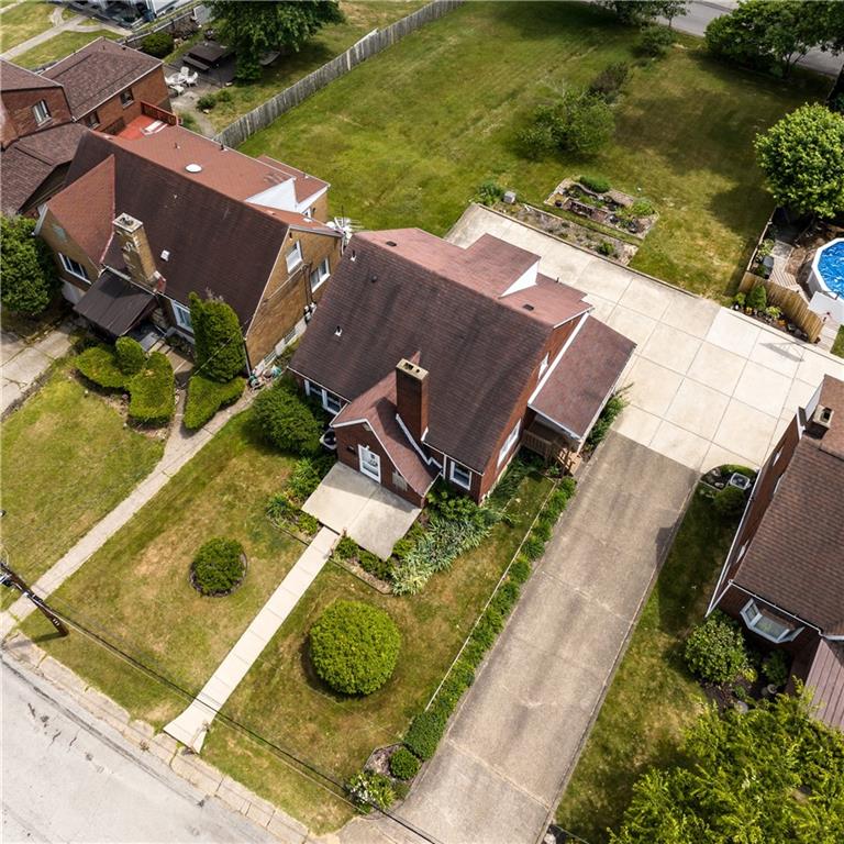 10204 Pearl Road Pittsburgh, PA 15235 - Photo 29 of 32 an aerial view of a house with a garden and lake view