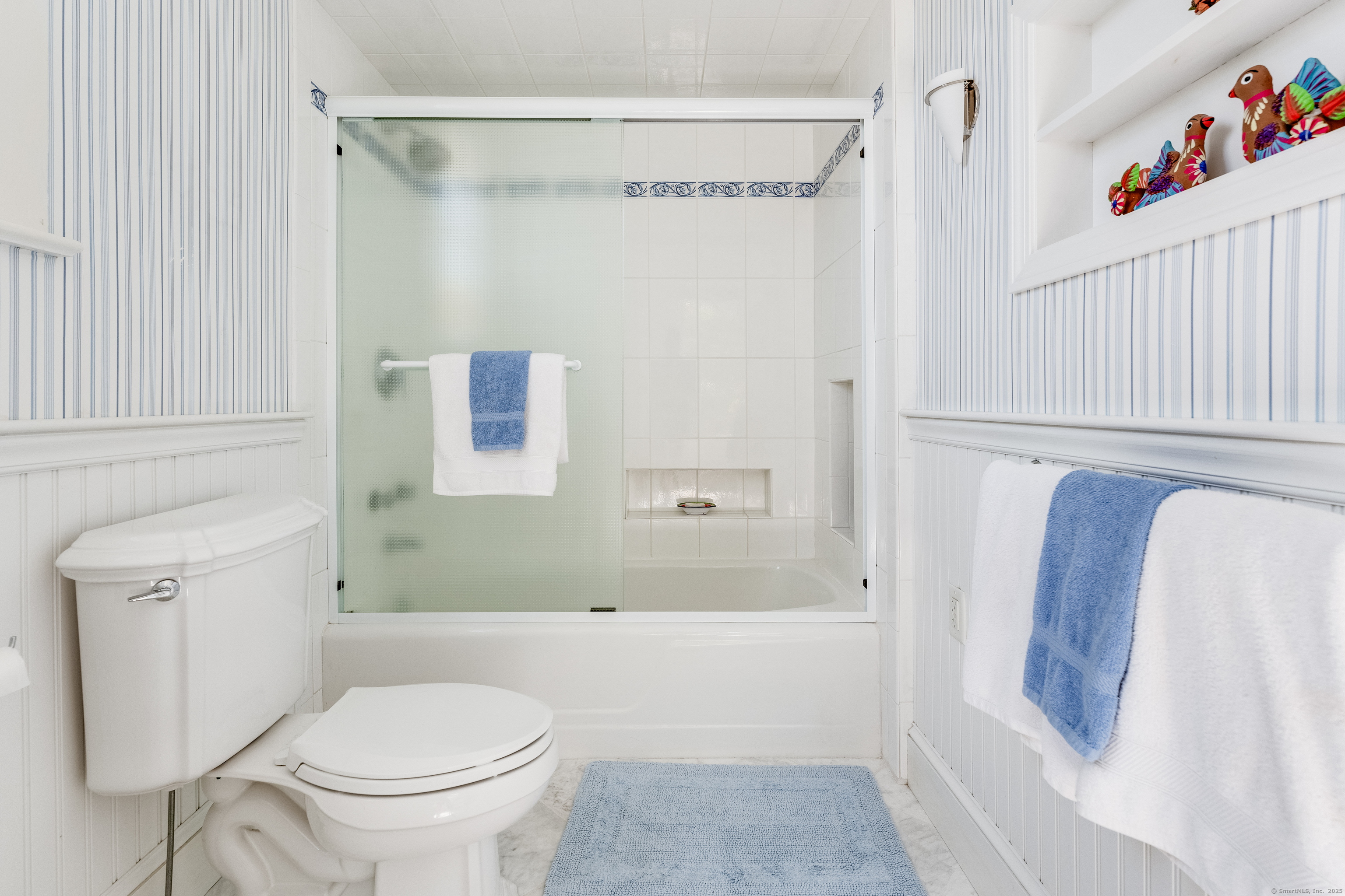 27 Church Street Groton, CT 06340 - Photo 27 of 37 a bathroom with a shower a toilet and a sink