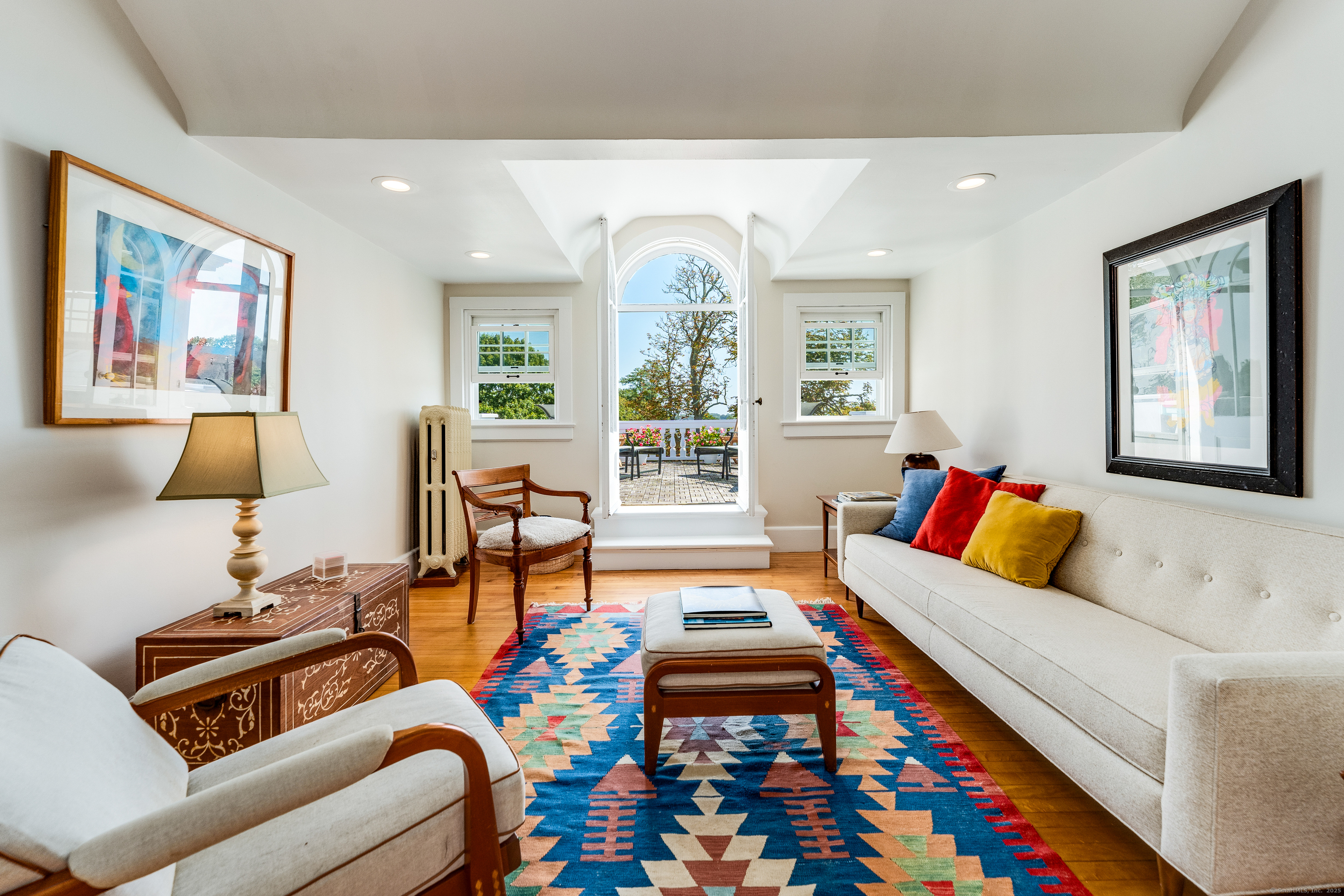 27 Church Street Groton, CT 06340 - Photo 30 of 37 a living room with furniture fireplace and a large window
