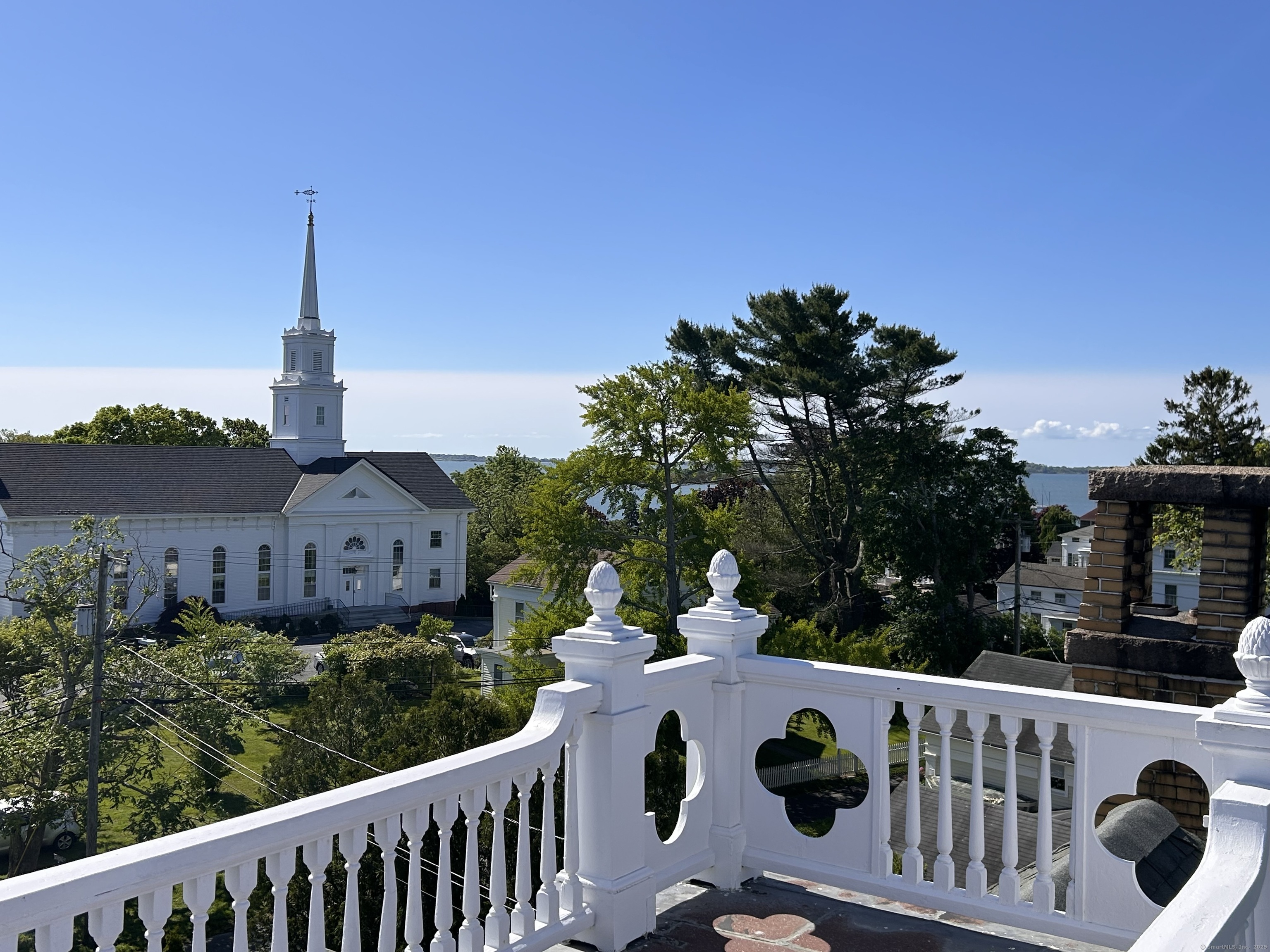 27 Church Street Groton, CT 06340 - Photo 36 of 37 a view of a roof deck with wooden fence and floor