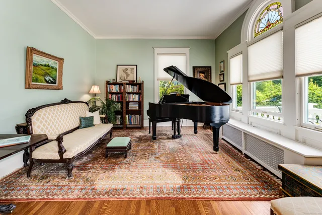 a living room with furniture and a window