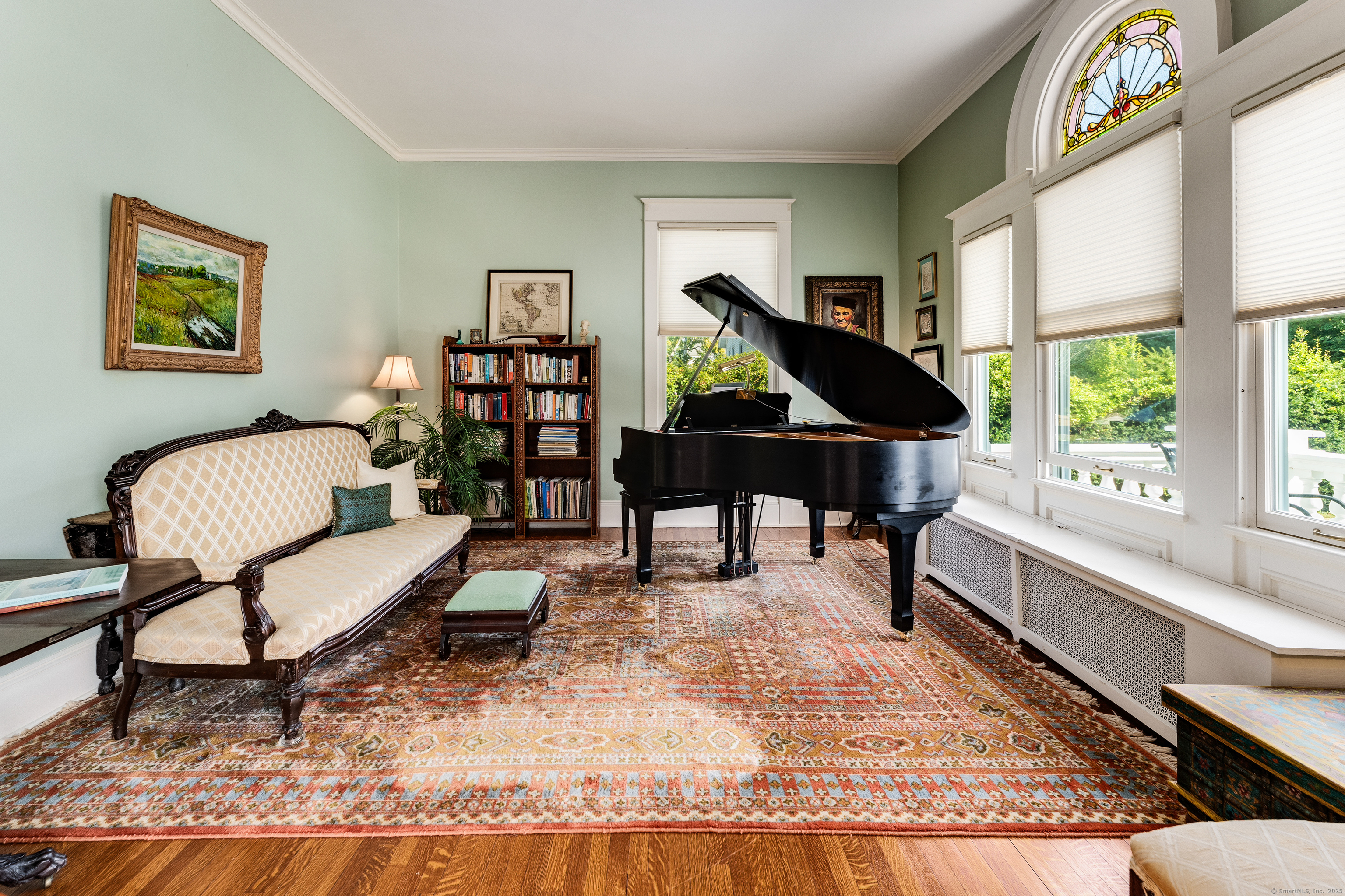 27 Church Street Groton, CT 06340 - Photo 4 of 37 a living room with furniture and a window