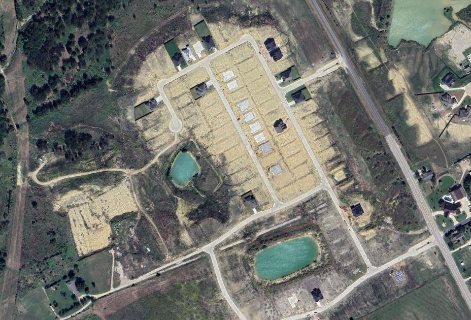 232 Cattleman Street Venus, TX 76084 - Photo 5 of 8 an aerial view of a house with a yard