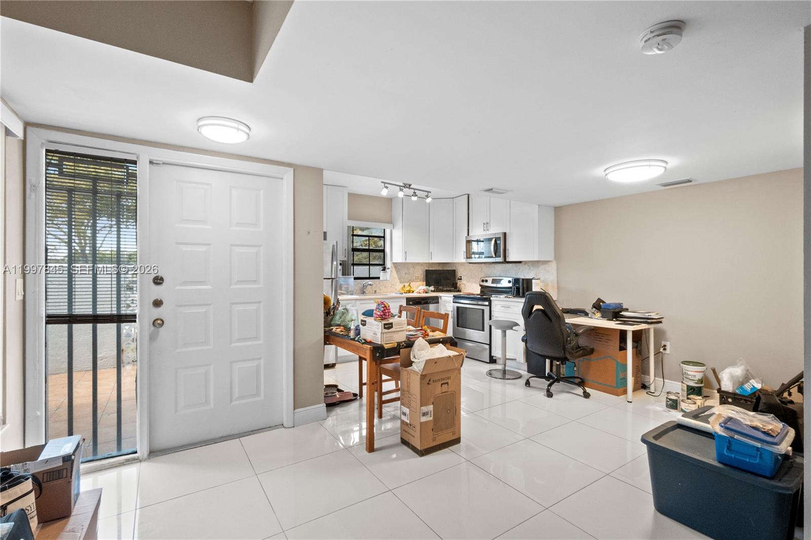 6211 Southwest 138th Court, Unit B Miami, FL 33183 - Photo 5 of 24 a view of a storage & utility room