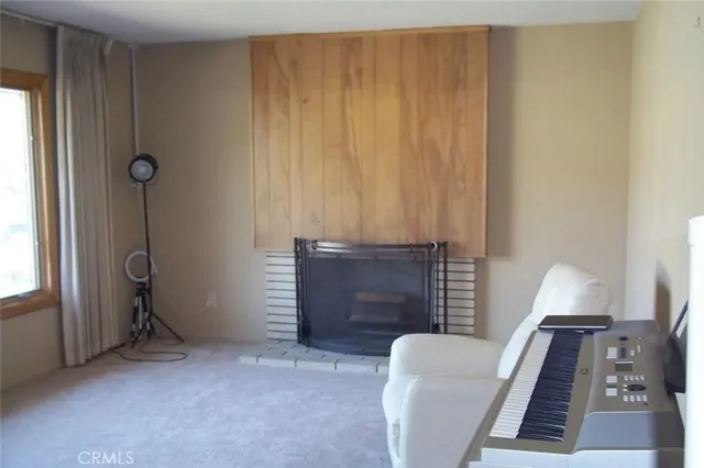 a room with furniture and a window