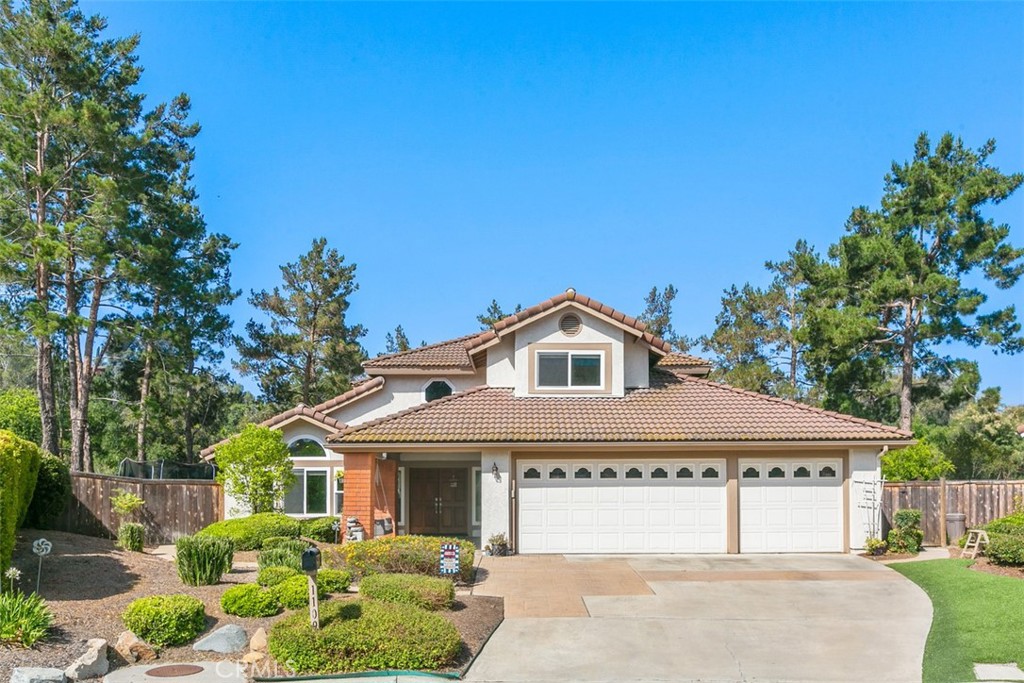 1109 Sundale Road El Cajon, CA 92019 - Photo 1 of 1 a front view of a house with a garden