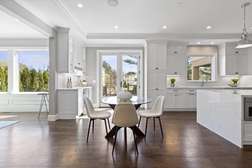 11 Fairhaven Road Newton, MA 02459 - Photo 16 of 40 a view of a dining room with furniture window and wooden floor
