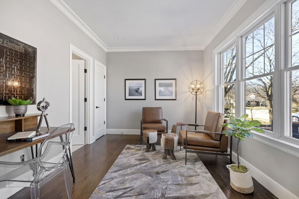11 Fairhaven Road Newton, MA 02459 - Photo 23 of 40 a living room with furniture and a large window