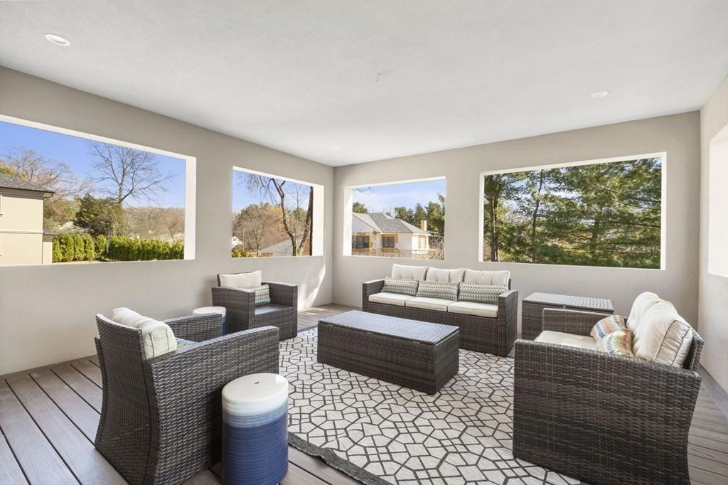 11 Fairhaven Road Newton, MA 02459 - Photo 34 of 40 a living room with furniture and a large window