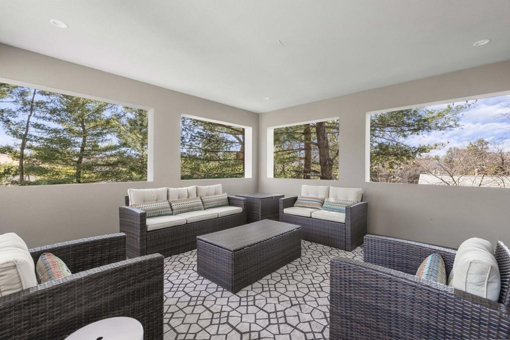 11 Fairhaven Road Newton, MA 02459 - Photo 35 of 40 a living room with furniture and a large window