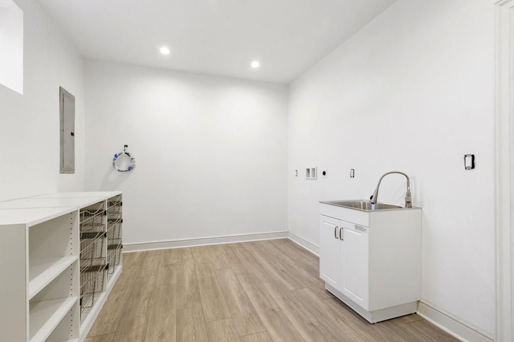 11 Fairhaven Road Newton, MA 02459 - Photo 38 of 40 a view of a kitchen with a sink and cabinets