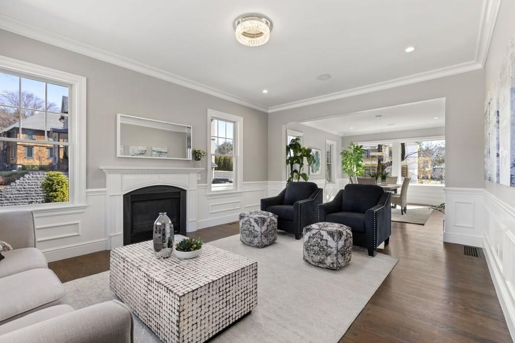 11 Fairhaven Road Newton, MA 02459 - Photo 4 of 40 a living room with furniture and a fireplace