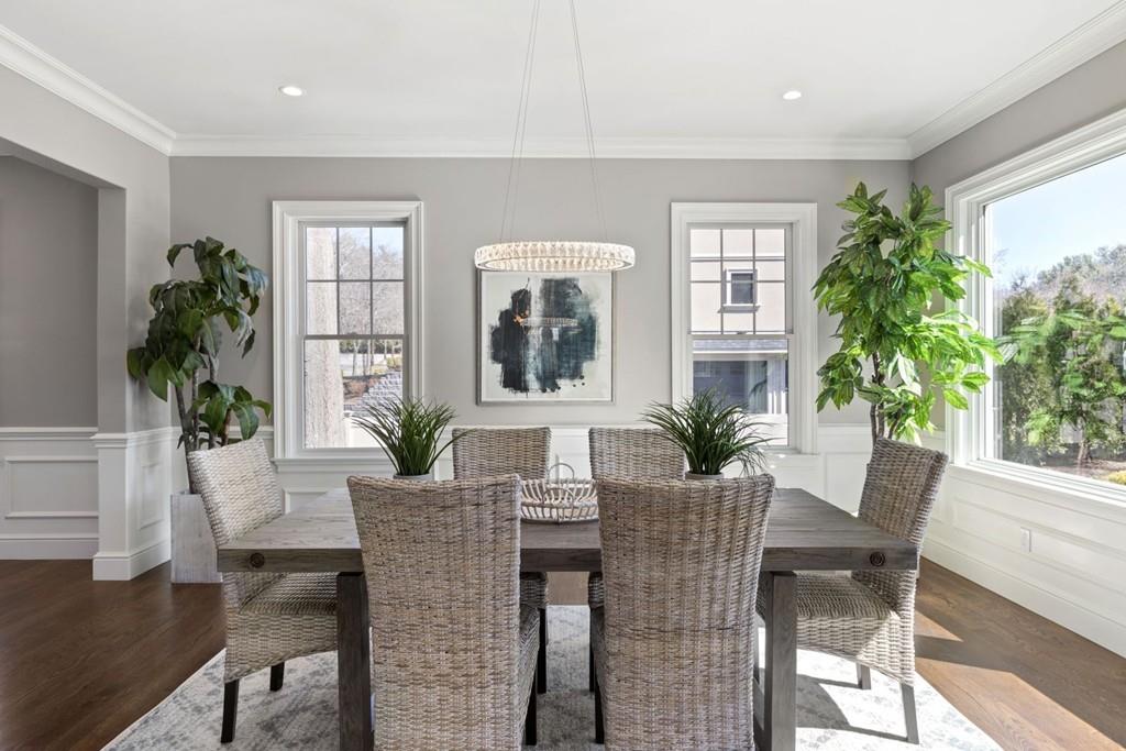 11 Fairhaven Road Newton, MA 02459 - Photo 7 of 40 a view of a dining room with furniture window and wooden floor