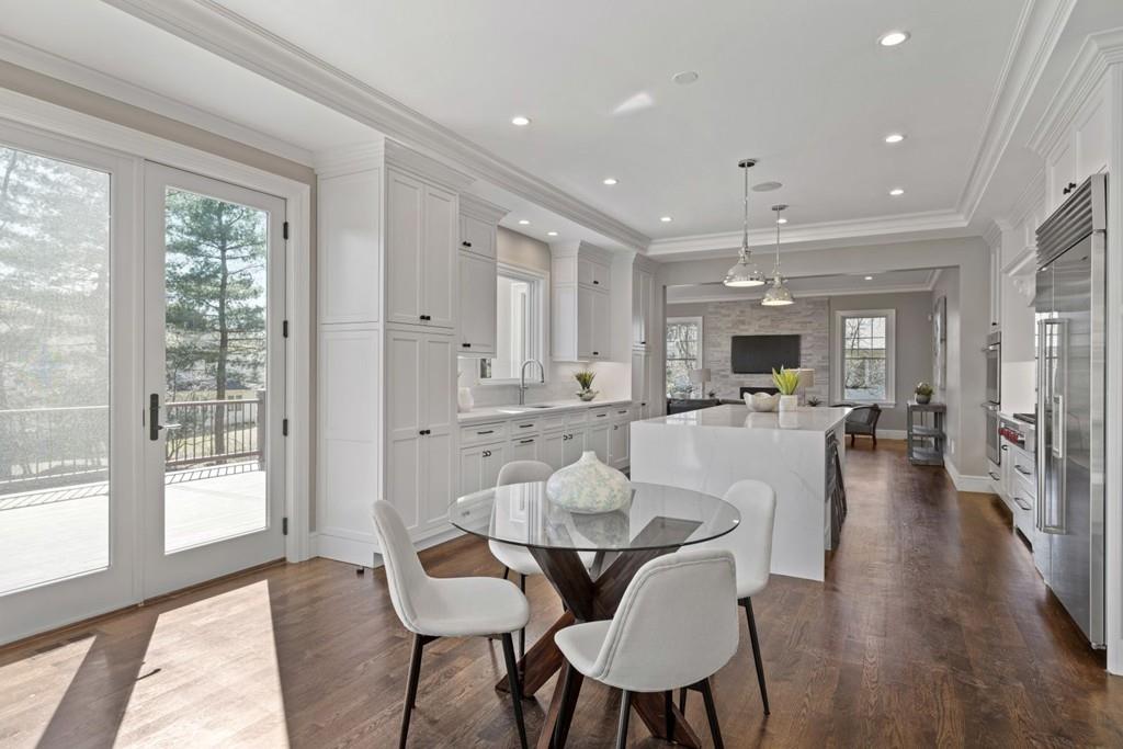 11 Fairhaven Road Newton, MA 02459 - Photo 10 of 40 a view of a dining room with furniture and wooden floor