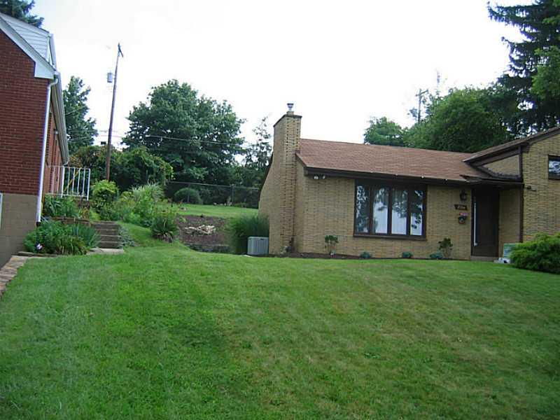 2394 Rose Garden Road Pittsburgh, PA 15220 - Photo 23 of 25 Exterior Front. large front yard