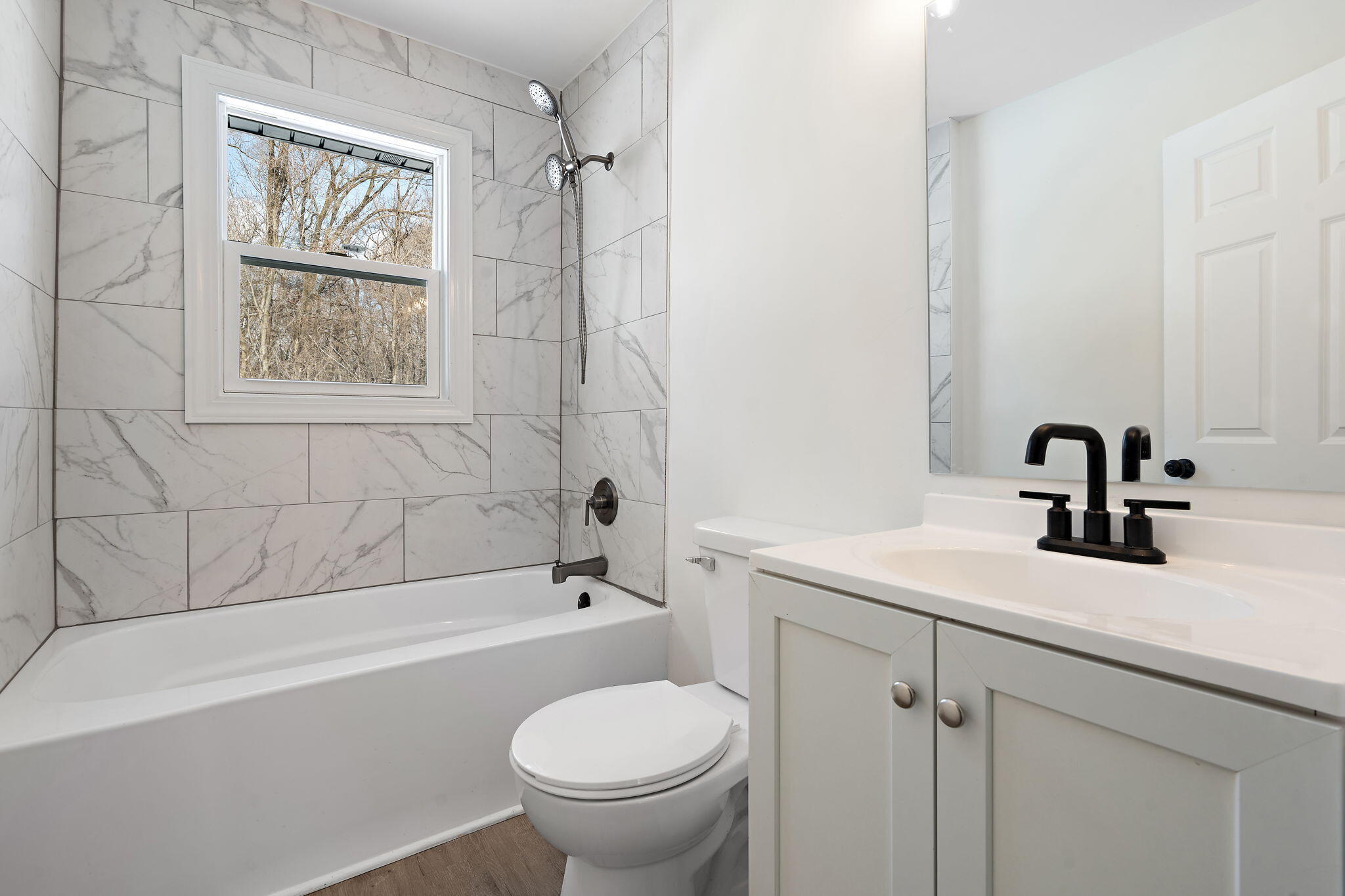 2014 East Elm Street Griffith, IN 46319 - Photo 8 of 14 a bathroom with a sink and a bathtub