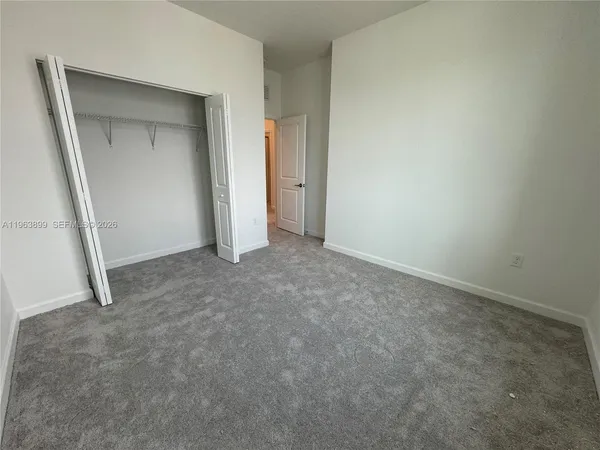 an empty room with closet