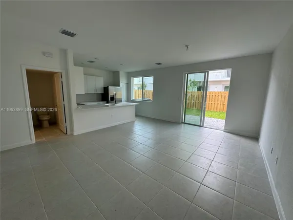 a view of a livingroom with a staircase