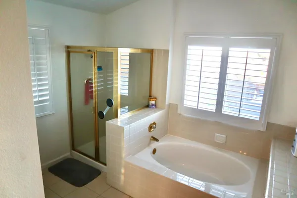 a kitchen with a sink and a refrigerator